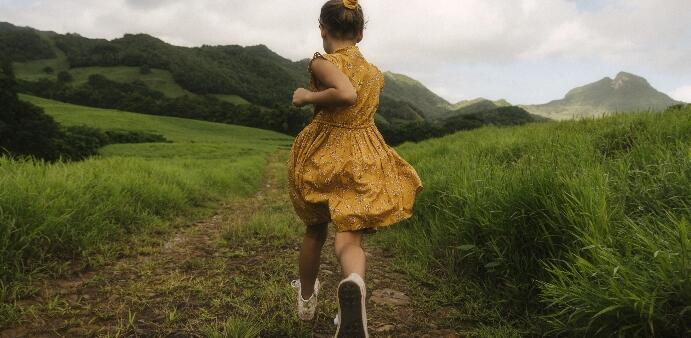 Girl running through the Ferney